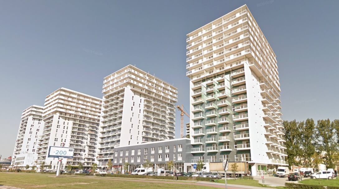 Projekty wykonawcze dla budynków 18-kondygnacyjnych pod nazwą „Cztery Oceany” w Gdańsku przy ul. Obrońców Wybrzeża. Widok ogólny po zakończeniu budowy